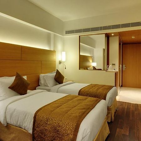 Hotel Platinum Rajkot Quarto foto