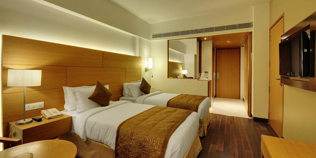 Hotel Platinum Rajkot Quarto foto